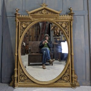 Giant 1885 Highly Ornate Exuberant Carved Gold Painted Oval Mirror with Griffins (SOLD)