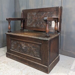 Dark Oak Early 20th Century Carved Monks Bench with Green Man (SOLD)