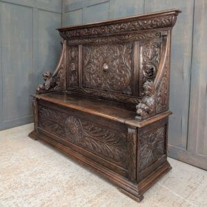 16th Century Style Highly Carved Oak Monks Bench with Romayne Heads