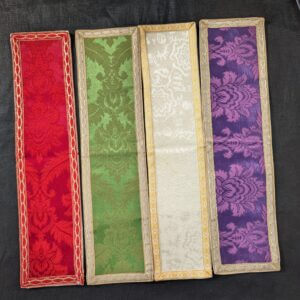 Four Apparrelled Amices In Purple, White, Green and Red