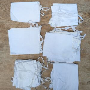 A Box of 11 Amices in Linen, Cotton and Fine Cotton